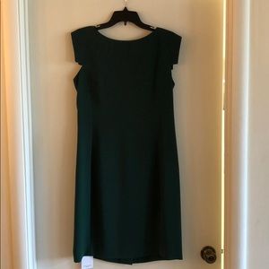 Green dress with cap sleeves.